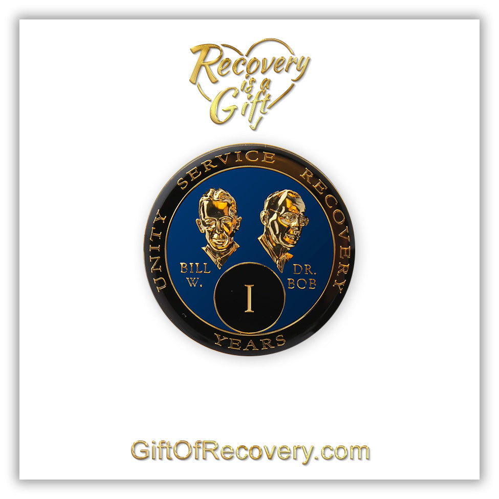 1 year AA Bill & Bob Big Book blue recovery medallion, black around the rim with Unity, Service and recovery embossed 14k gold-plated brass, this medallion is to honor our founders and our time, stylized busts of Bill W. and Dr. Bob, with their names, are embossed 14k gold-plated brass, the medallion is sealed with resin for a glossy finish. seen on a white 3x3 card with recovery is a gift going through an open heart at the top and giftofrecovery.com on the bottom, both in the color gold.
