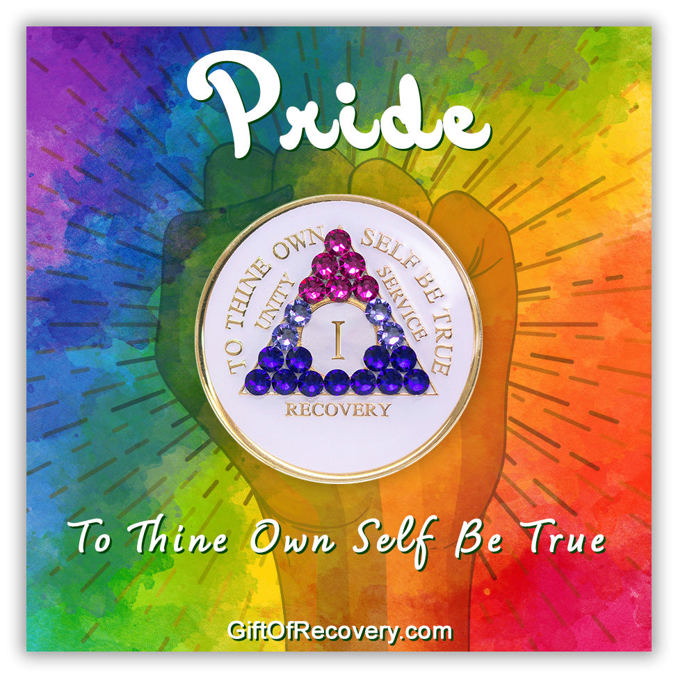 1 year AA medallion pearl white with 21 genuine crystals that form the triangle and are in the color of the bisexual flag, to represent pride and sobriety, the AA slogan and three legacies are embossed with 14k gold-plated brass and sealed with resin for a glossy finish that will last and is scratch proof, pictured on a tie-dye 3x3 card with a silhouette of a fist and the words pride at the top and to thine own self be true on the bottom, both in bold white.