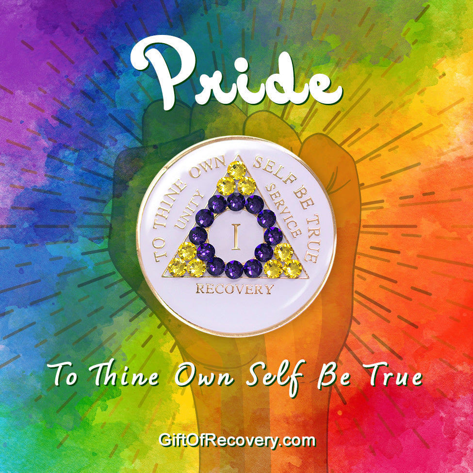 1 year AA medallion pearl white with 21 genuine crystals that form the triangle and are in the color of the Intersex flag, colors are yellow and purple, to represent pride and sobriety, the AA slogan and three legacies are embossed with 14k gold-plated brass and sealed with resin for a glossy finish that will last and is scratch proof, pictured on tie-dye 3x3 card with a silhouette of a fist and the words pride and to thine own self be true in bold white.