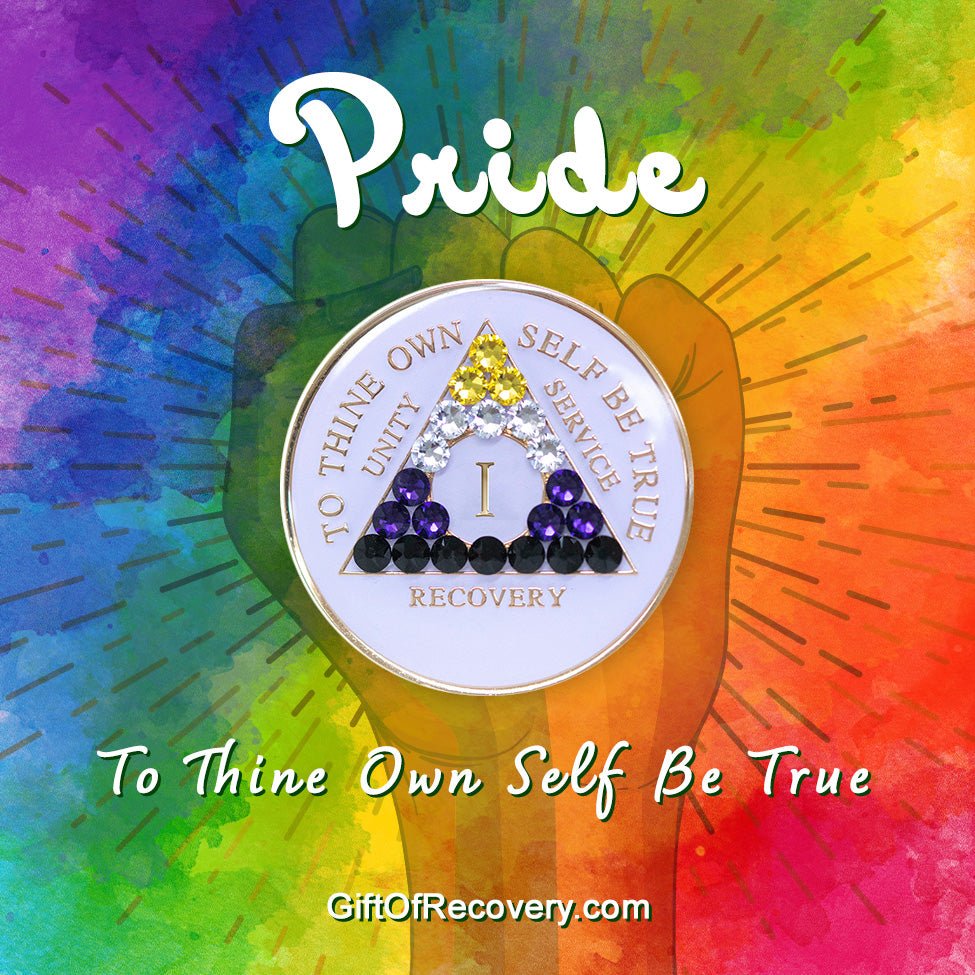 1 year AA medallion pearl white with 21 genuine crystals that form the triangle and are in the color of the nonbinary flag, to represent pride and sobriety, the AA slogan and three legacies are embossed with 14k gold-plated brass and sealed with resin for a glossy finish that will last and is scratch proof, pictured on tie-dye 3x3 card with a silhouette of a fist and the words pride and to thine own self be true in bold white.