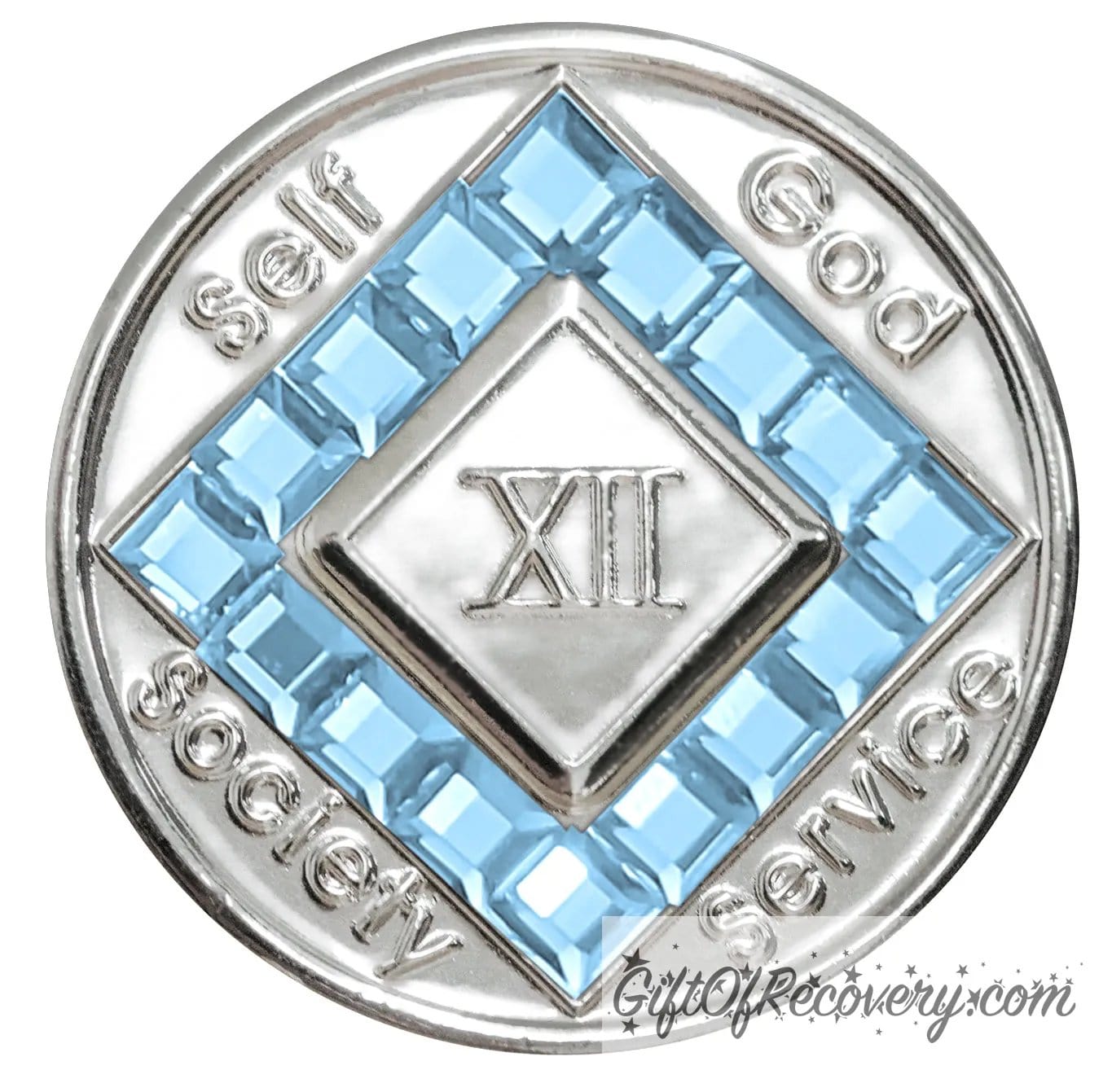12 year nickel plated NA medallion with self, God, Society, and Service around the outer rim of the diamond, 16 square Aquamarine CZ genuine crystals that form the diamond around the roman numeral.