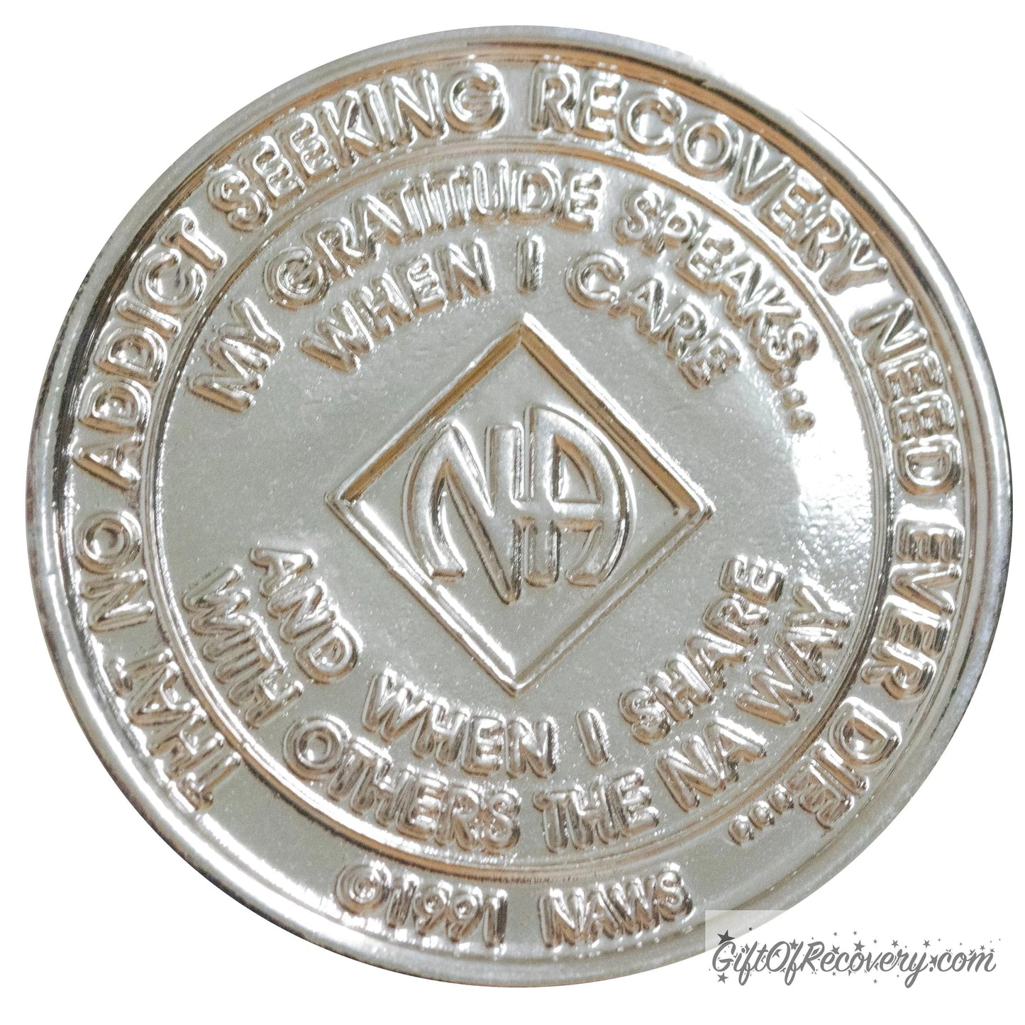 Back of NA nickel plated crystalized diamond medallion has the NAWS official slogans and motto.