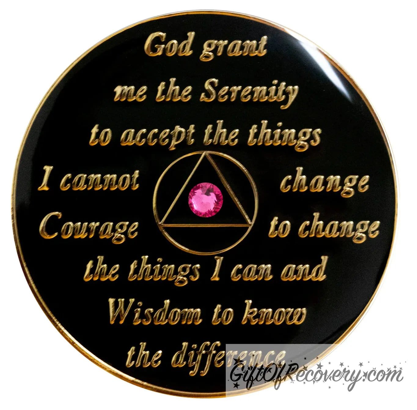 Back of AA black onyx recovery medallion is black and has the serenity prayer, outer rim, and the circle triangle in the center embossed with 14k gold-plated brass, the circle and triangle are black with one single pink genuine crystal in the center of the triangle, the AA medallion is sealed with resin for a shiny finish.
