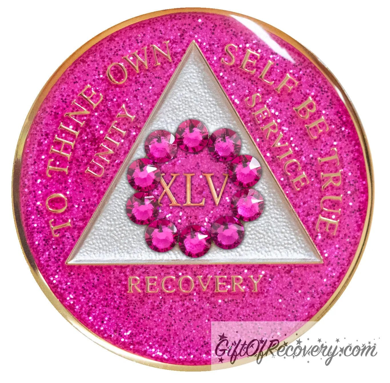 45 year AA medallion Pink Glitter Princess adorned with 10 pink zircon genuine crystals in a circle around the roman numeral, representing the unity that binds us, the triangle is pearl white and the AA moto is embossed with 14k gold-plated brass, sealed with resin for a shiny finish that will last and is scratch proof.