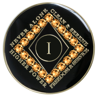 1 year black Onyx Clean time recovery medallion with a diamond shape within a diamond shape for a 3D effect, 20 gold Topaz CZ genuine crystals form the outer diamond shape, never alone, clean & serene, Higher Power, freedom & service in 14k gold-plated brass, sealed with resin for a glossy finish that will last and is scratch proof.