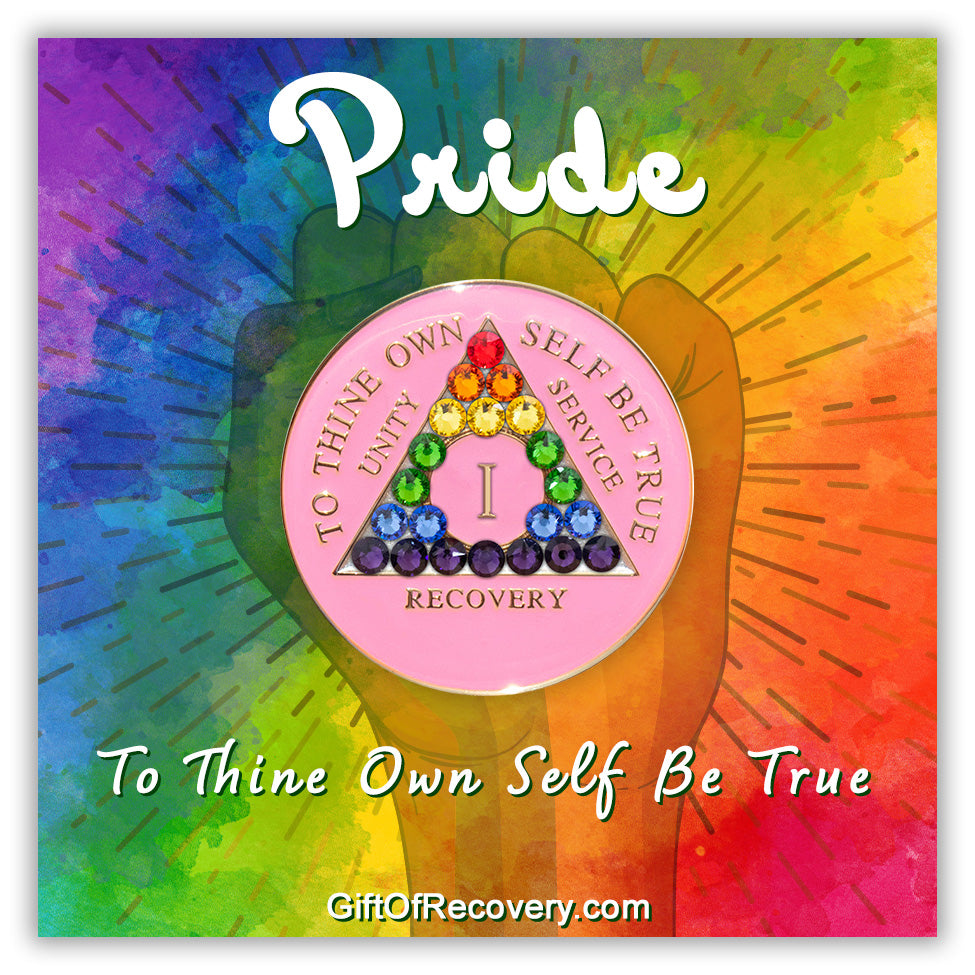 1 year AA medallion princess pink with 21 genuine crystals that make a rainbow in the triangle, to represent the LBGTQIA+ community, AA slogan and three legacies are embossed with 14k gold-plated brass and sealed for a glossy finish that will last, featured on a tie-dye 3x3 card with a silhouette of a fist and to thine own self be true at the bottom in white, with pride at the top.