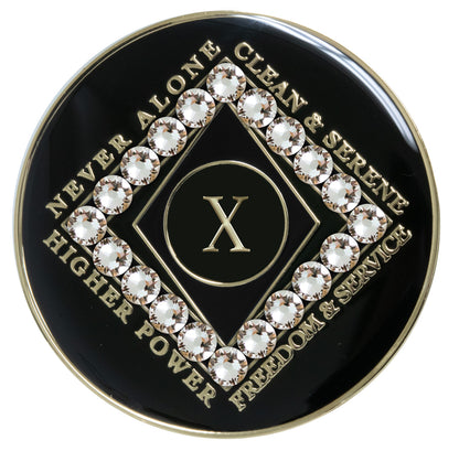 10 year black Onyx Clean time recovery medallion with a diamond shape within a diamond shape for a 3D effect, 20 diamond CZ genuine crystals form the outer diamond shape, never alone, clean & serene, Higher Power, freedom & service in 14k gold-plated brass, sealed with resin for a glossy finish that will last and is scratch proof.