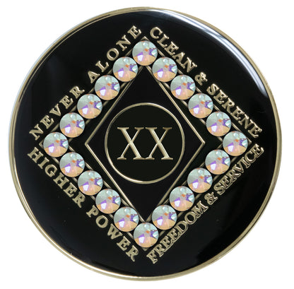 20 year black Onyx Clean time recovery medallion with a diamond shape within a diamond shape for a 3D effect, 20 Aurora Borealis genuine crystals form the outer diamond shape, never alone, clean & serene, Higher Power, freedom & service in 14k gold-plated brass, sealed with resin for a glossy finish that will last and is scratch proof.