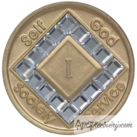 1 year bronze NA medallion with self, God, Society, and Service around the outer rim of the diamond, 16 diamond shaped CZ genuine diamond crystals, that form the diamond around the roman numeral. 