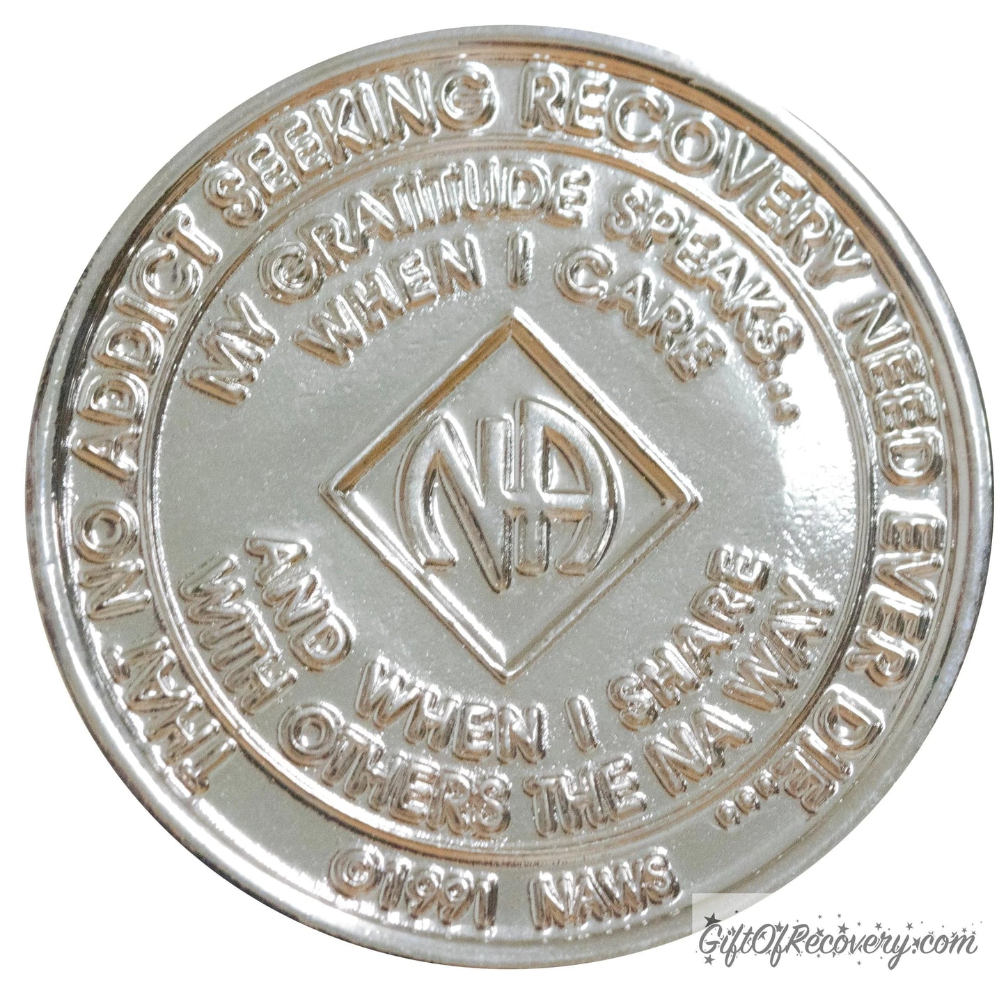 Back of NA nickel plated crystalized aquamarine medallion has the NAWS official slogans and motto. 