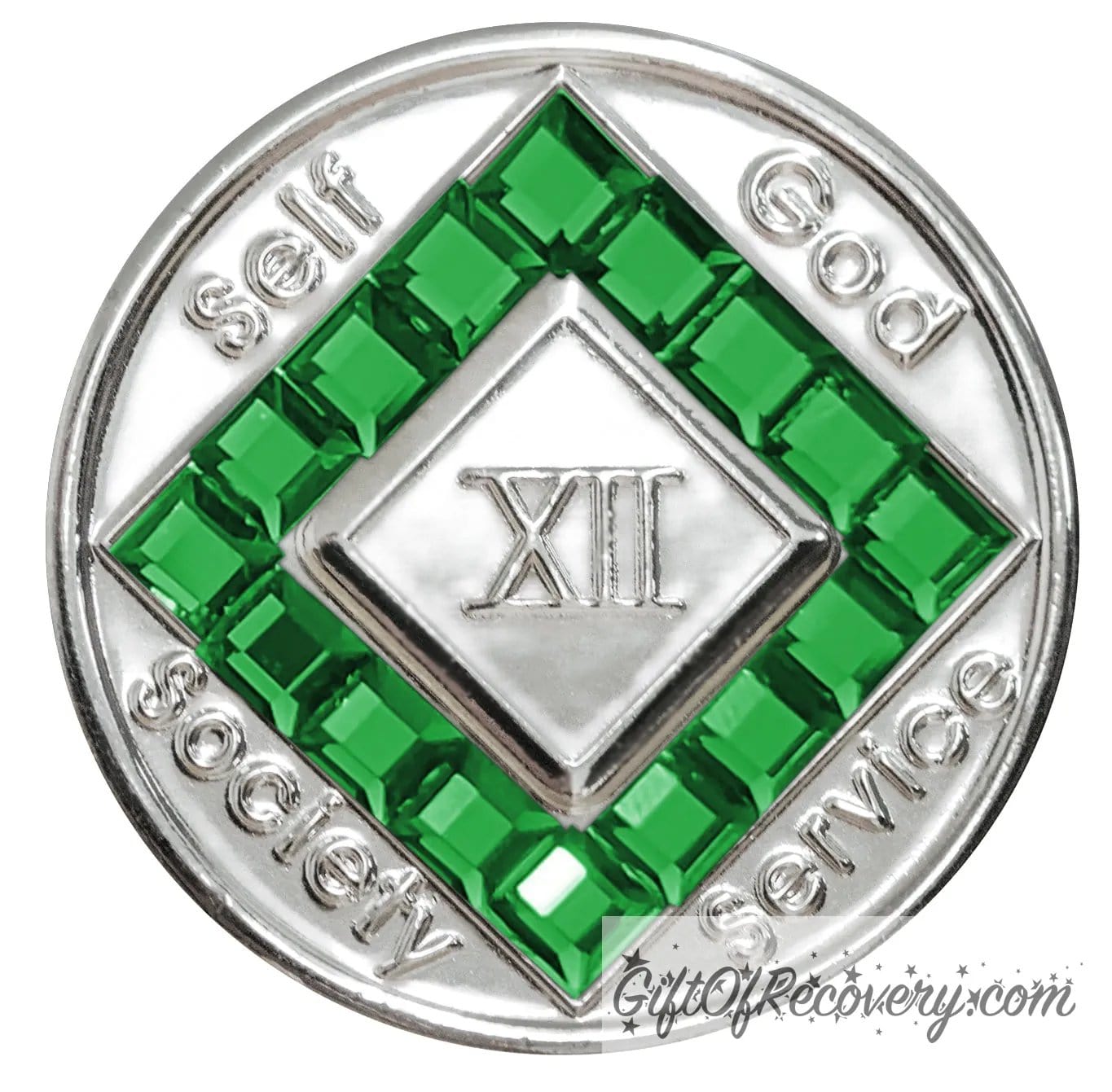 12 year nickel plated NA medallion with self, God, Society, and Service around the outer rim of the diamond, 16 square Emerald CZ genuine crystals that form the diamond around the roman numeral. 