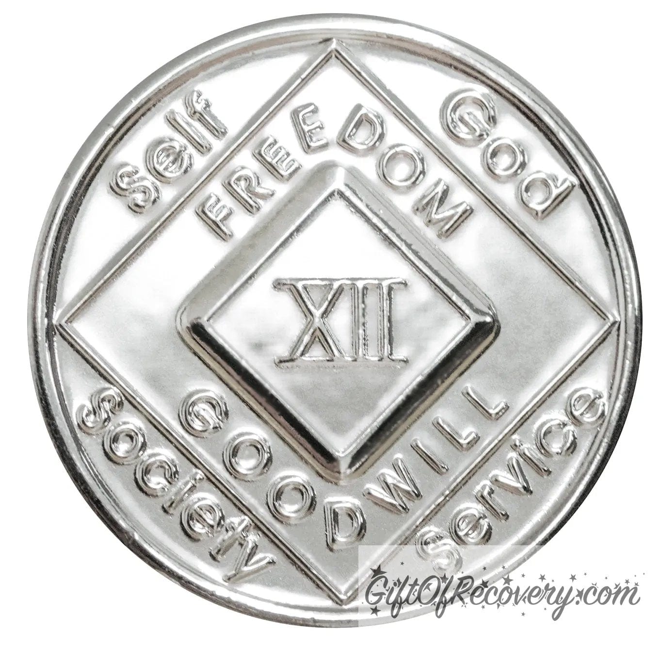 12 year nickel plated NA medallion with self, God, Society, and Service around the outer rim of the diamond, freedom and goodwill on the inside of the diamond.