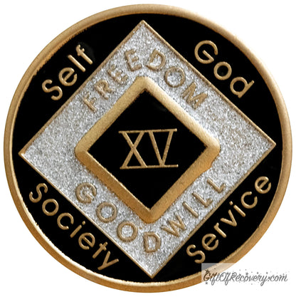 15 year official Narcotics Anonymous medallion, black and silver, with self, God, Society, and Service around the outer rim of the, freedom and goodwill on the inside of the silver diamond.