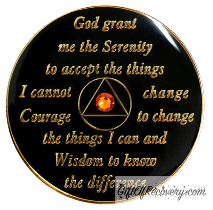 Back of 10th step AA medallion in all black onyx, with serenity prayer and symbol in 14k gold, with one orange genuine crystal in the center of the triangle.