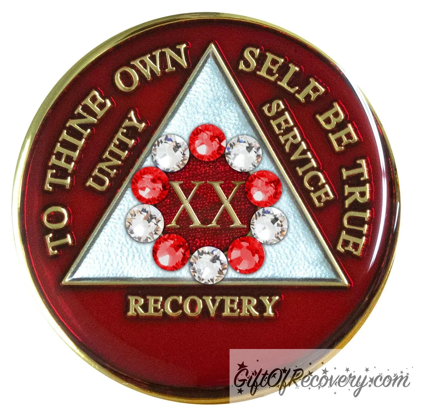 20 Year AA medallion ruby red with 6 ruby red genuine crystals and 6 diamond CZ around the roman numeral symbolizing the 10step in recovery, emphasizing action and reflection, the triangle is pearl white with to thine own self be true, unity, service, recovery embossed with 14k gold-plated brass, sealed with resin for a lasting finish.