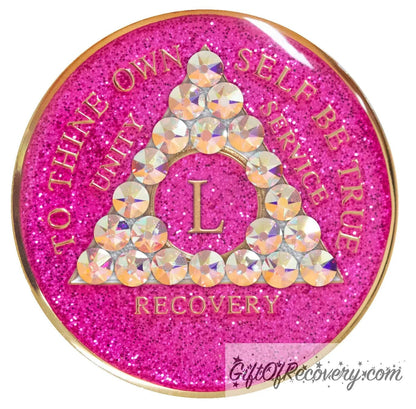 50 year AA medallion pink glitter princess adorned with 21 Aurora Borealis genuine crystals to bring out the sober princess in you the crystals are in the shape of the triangle, to thine own self be true and AA moto embossed with 14k gold-plated brass, recovery medallion is sealed with resin for a glossy finish that will last and is scratch proof.