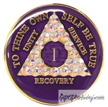 1 year AA medallion Purple Amethyst adorned with 21 Aurora Borealis Genuine crystals for the triangle, to thine own self be true, unity, service, recovery along with roman numeral are embossed with 14k gold-plated brass, recovery medallion is sealed with resin for a shiny finish that will last.