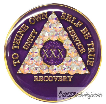 30 year AA medallion Purple Amethyst adorned with 21 Aurora Borealis Genuine crystals for the triangle, to thine own self be true, unity, service, recovery along with roman numeral are embossed with 14k gold-plated brass, recovery medallion is sealed with resin for a shiny finish that will last.