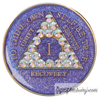 1 year AA medallion Purple glitter with 21 Aurora Borealis genuine crystals in the shape of the triangle, to thine own self be true, unity, service, recovery, the outer rim, and the roman numeral are embossed with 14k gold-plated brass, the recovery medallion is sealed in resin for a shiny finish that lasts.