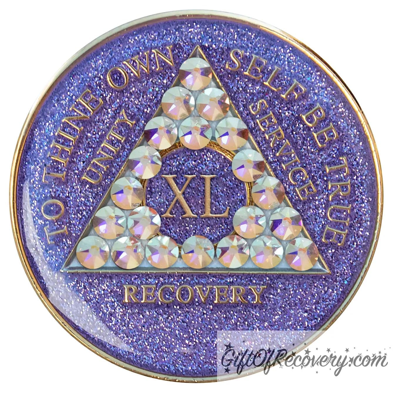 40 year AA medallion Purple glitter with 21 Aurora Borealis genuine crystals in the shape of the triangle, to thine own self be true, unity, service, recovery, the outer rim, and the roman numeral are embossed with 14k gold-plated brass, the recovery medallion is sealed in resin for a shiny finish that lasts.