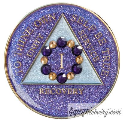 1 year AA medallion purple glitter Amethyst with 6 gold and 6 purple genuine crystals that form a circle to represent blooming through the 12 steps of recovery, to thine own self be true, unity, service, recovery embossed with 14k gold-plated brass, triangle is pearl white, sealed with resin for a shiny finish that will last and is scratch proof.