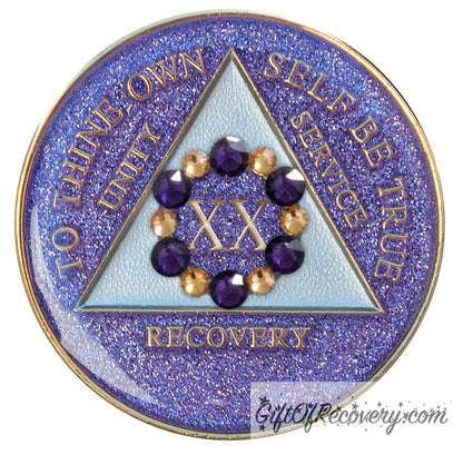 20 year AA medallion purple glitter Amethyst with 6 gold and 6 purple genuine crystals that form a circle to represent blooming through the 12 steps of recovery, to thine own self be true, unity, service, recovery embossed with 14k gold-plated brass, triangle is pearl white, sealed with resin for a shiny finish that will last and is scratch proof.