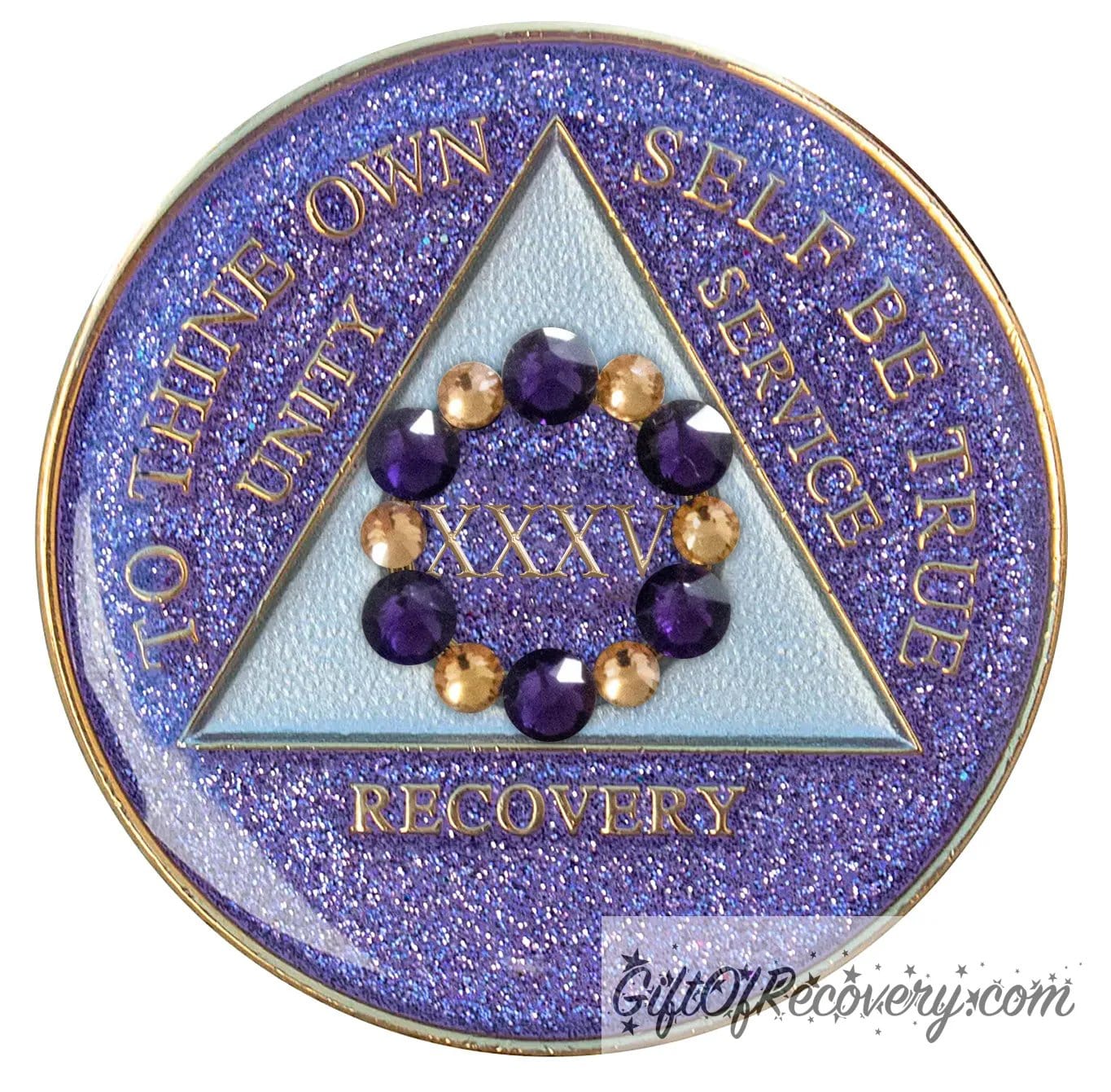 35 year AA medallion purple glitter Amethyst with 6 gold and 6 purple genuine crystals that form a circle to represent blooming through the 12 steps of recovery, to thine own self be true, unity, service, recovery embossed with 14k gold-plated brass, triangle is pearl white, sealed with resin for a shiny finish that will last and is scratch proof.