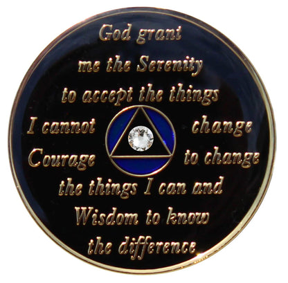 Back of Big Book blue CZ crystalized AA timeless recovery medallion is black with the circle blue and triangle black and has the serenity prayer, outer rim, and the circle triangle in the center 14k gold-plated brass, with one single diamond CZ genuine crystal in the center of the triangle, the recovery medallion is sealed with resin for a shiny finish.