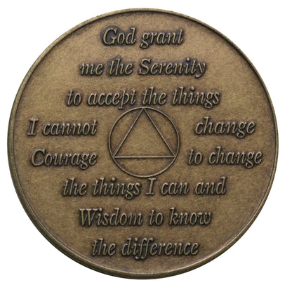 Back of 14 year bronze aa recovery medallion, with serenity prayer.