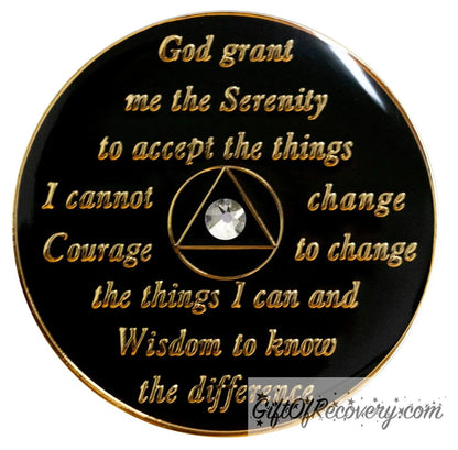 Back of chakra AA recovery medallion is black onyx and has the serenity prayer, outer rim, and the circle triangle in the center 14k gold-plated brass, the circle and triangle are black with one single diamond CZ genuine crystal in the center of the triangle, the recovery medallion is sealed with resin for a shiny finish. 