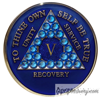 5 year AA medallion Big Book blue adorned with 21 genuine blue CZ crystals symbolizing the importance of our Big Book, to thine own self be true, unity, service, recovery are embossed with 14k gold-plated brass and sealed with resin for a glossy finish that is scratch proof and will last.