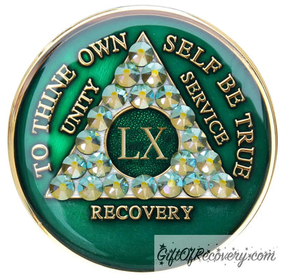 60 year AA medallion Emerald green with 21 genuine Peridot crystals that make the triangle, to represent beauty and peace in the program, AA slogan and three legacies are embossed with 14k gold-plated brass and sealed for a glossy finish that will last.