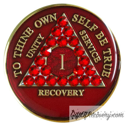 1 year AA medallion ruby red with 21 genuine ruby red crystals in the shape of the triangle for an incredible look, and to thine own self be true, unity, service, recovery, and roman numeral are in embossed with 14k gold-plated brass, the recovery medallion is sealed in resin for a shiny finish that will last and is scratch proof.