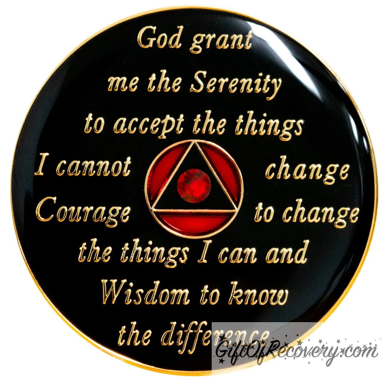 Back of AA Ruby red recovery medallion is black and has the serenity prayer, outer rim, and the circle triangle in the center embossed with 14k gold-plated brass, the circle is red and the triangle is black with one single red genuine crystal in the center of the triangle, the recovery medallion is sealed with resin for a shiny finish. 