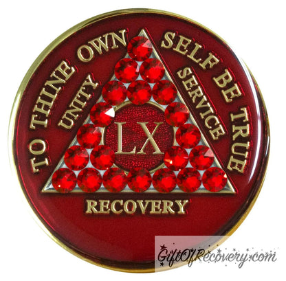 60 year AA medallion ruby red with 21 genuine ruby red crystals in the shape of the triangle for an incredible look, and to thine own self be true, unity, service, recovery, and roman numeral are in embossed with 14k gold-plated brass, the recovery medallion is sealed in resin for a shiny finish that will last and is scratch proof.