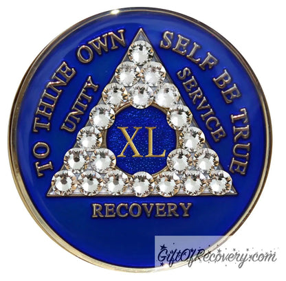 40 year AA medallion Big Book Blue with 21 genuine diamond CZ crystals to form the triangle and emphasize strength under pressure that is built in the program, AA slogan and three legacies are embossed 14k gold-plated brass, recovery medallion is sealed with resin for a shiny finish.