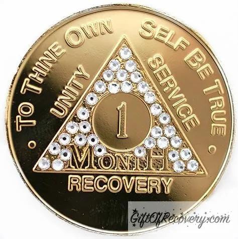 1 month gold-plated AA recovery medallion with 29 diamond CZ genuine crystals for the triangle along with the AA slogan and three legacies.