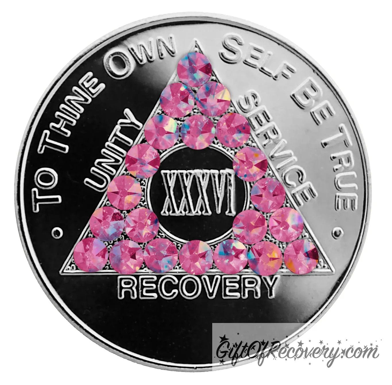 36 year aluminum AA recovery medallion with 21 pink genuine crystals for the triangle along with the AA slogan and three legacies.