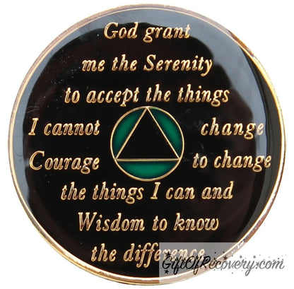 Back of Emerald green AA recovery medallion is black with the circle is green and triangle black and has the serenity prayer, outer rim, and the circle triangle in the center 14k gold-plated brass, the recovery medallion is sealed with resin for a shiny finish.