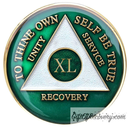 40 year AA medallion Emerald green, to symbolize luck and prosperity when you work the program, triangle is pearl white, to thine own self be true, unity, service, recovery, and roman numeral are embossed with 14k gold-plated brass, the recovery medallion is sealed with resin for a glossy finish that will last and is scratch free.