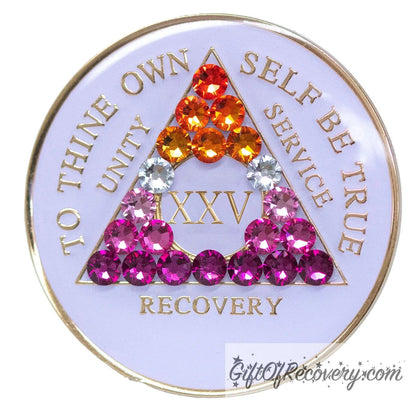 25 year AA medallion pearl white with 21 genuine crystals that form the triangle and are in the color of the Lesbian flag, colors are, to represent pride and sobriety, the AA slogan and three legacies are embossed with 14k gold-plated brass and sealed with resin for a glossy finish that will last and is scratch proof.