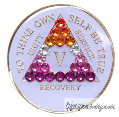 1 year AA medallion pearl white with 21 genuine crystals that form the triangle and are in the color of the Lesbian flag, colors are, to represent pride and sobriety, the AA slogan and three legacies are embossed with 14k gold-plated brass and sealed with resin for a glossy finish that will last and is scratch proof.