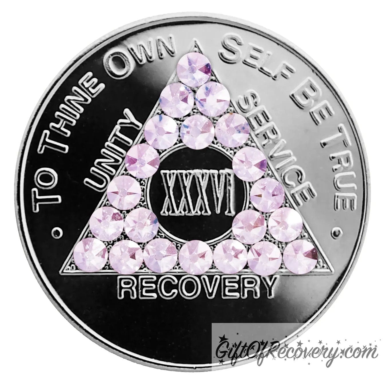 36 year nickel AA recovery medallion with 21 light pink genuine crystals for the triangle along with the AA slogan and three legacies.