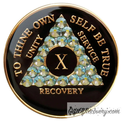 10 year AA medallion Black onyx, with 21 genuine Peridot AB crystals in the shape of the triangle, to thine own self be true, unity, service, recovery, and the roman numeral, are embossed with 14k gold-plated brass, the recovery medallion is sealed with resin for a glossy finish that lasts and is scratch proof.