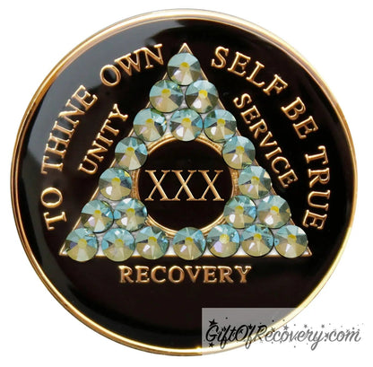 30 year AA medallion Black onyx, with 21 genuine Peridot AB crystals in the shape of the triangle, to thine own self be true, unity, service, recovery, and the roman numeral, are embossed with 14k gold-plated brass, the recovery medallion is sealed with resin for a glossy finish that lasts and is scratch proof.