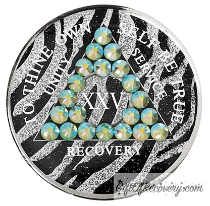 25 year Zebra glitter style AA medallion with 21 genuine peridot crystals, AA moto, unity, service, recovery, and roman numeral are in white and blend into the pattern, so you can let your recovery shine, not your time, the outer rim is silver plated, sealed in a high-quality, chip and scratch-resistant resin dome giving it a beautiful glossy look that will last.