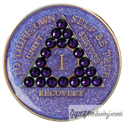 1 year glitter purple AA medallion with 21 purple velvet genuine crystals, that create the triangle in middle, and to thine own self be true, unity, service, recovery, the roman numeral in the center of the circle triangle, along with the rim of the recovery medallion, are embossed in 14 gold plated brass.