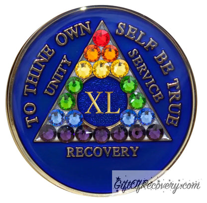 40 year AA medallion Big Book blue with 21 genuine crystals in rainbow form and the shape of the triangle, representing renewal and growth in the program, and also to represent the LBGTQIA+ community, AA slogan and three legacies embossed with 14k gold-plated brass, sealed with resin for a glossy finish that is scratch proof and will last.