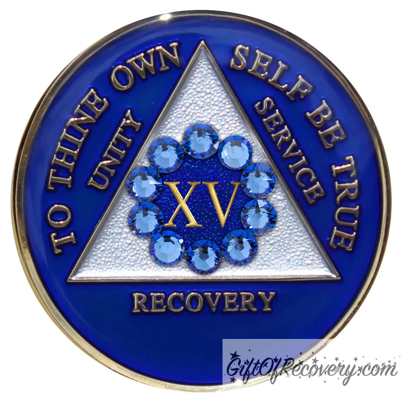 15 year AA medallion Big Book blue, 10 blue genuine crystals in a circle around the roman numeral emphasizing unity in recovery, unity is the legacy that binds us, triangle is pearl white, AA slogan and three legacies are embossed 14k gold-plated brass, recovery medallion is sealed with resin for a glossy finish.