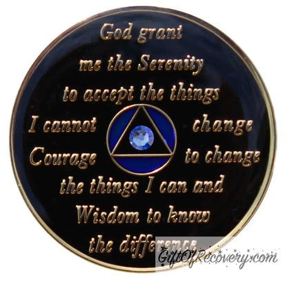 Back of Big Book blue unity CZ crystalized AA recovery medallion is black onyx and has the serenity prayer, outer rim, and the circle triangle in the center 14k gold-plated brass, the circle is blue and triangle is black with one single blue CZ genuine crystal in the center of the triangle, the recovery medallion is sealed with resin for a shiny finish.